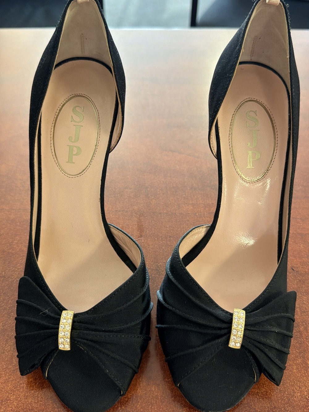 SJP by Sarah Jessica Parker Black Open-Toe Bow Pumps with Gold Rhinestone Accent